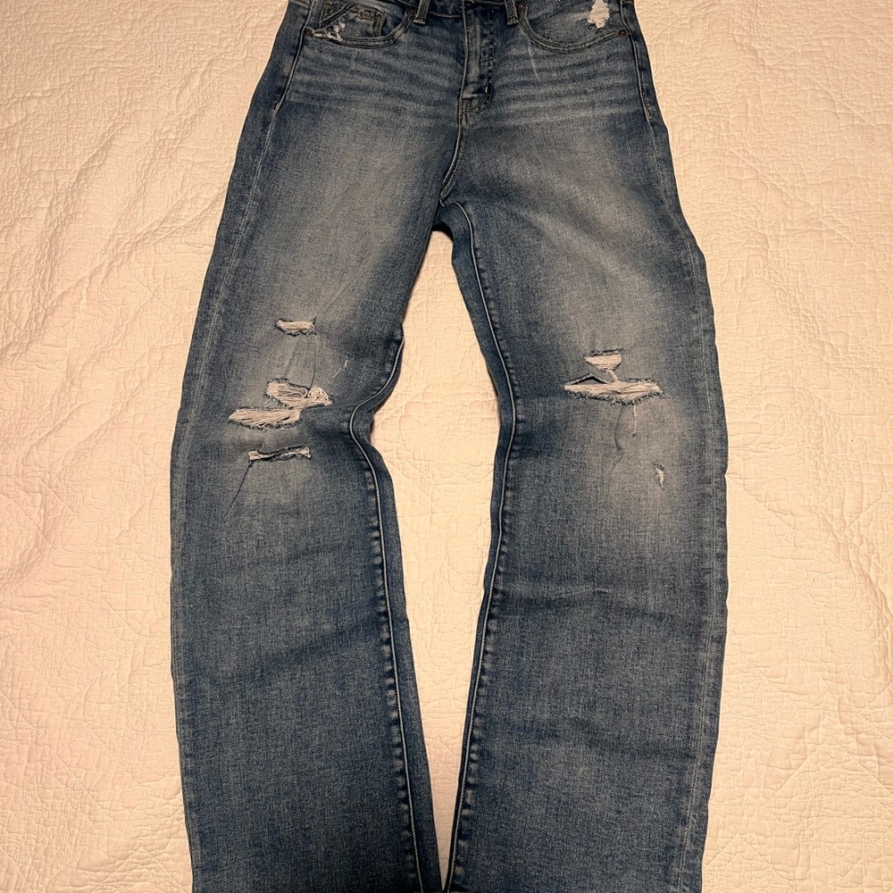 Buckle Women's High Rise Distressed Blue Jeans
